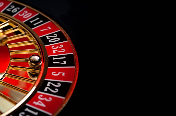 Mobile phone displaying JILI slot game interface with bet controls and payline visualization
